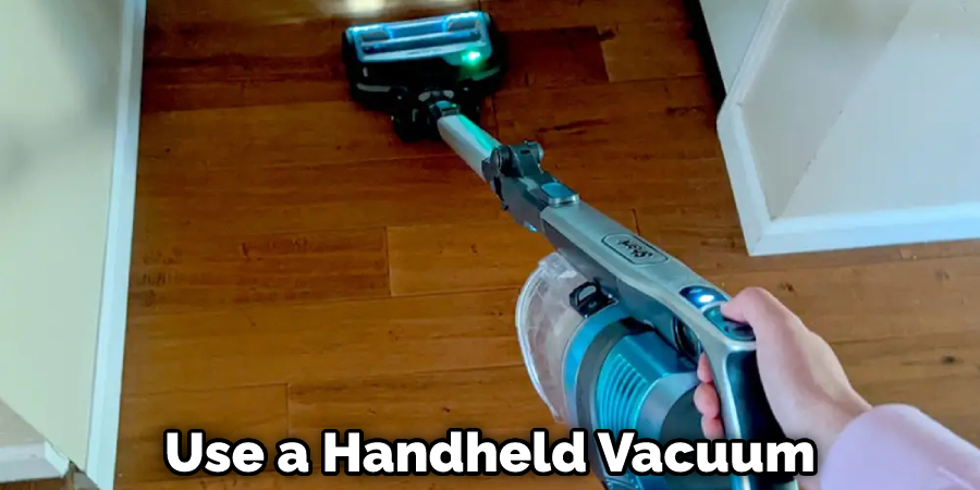 Use a Handheld Vacuum