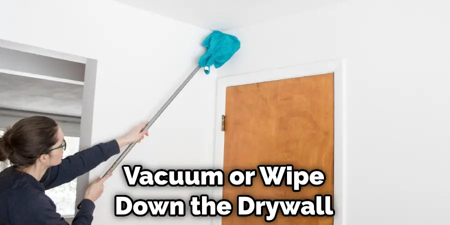 Vacuum or Wipe Down the Drywall