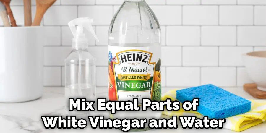 Mix Equal Parts of White Vinegar and Water