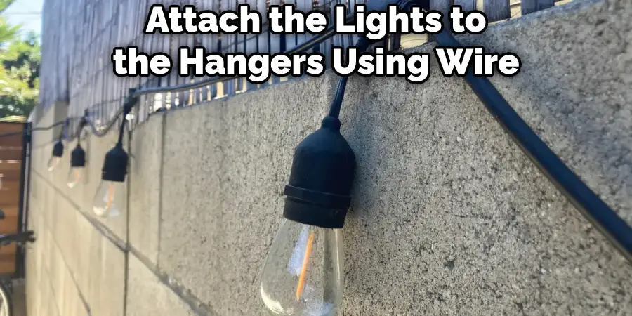 Attach the Lights to the Hangers Using Wire