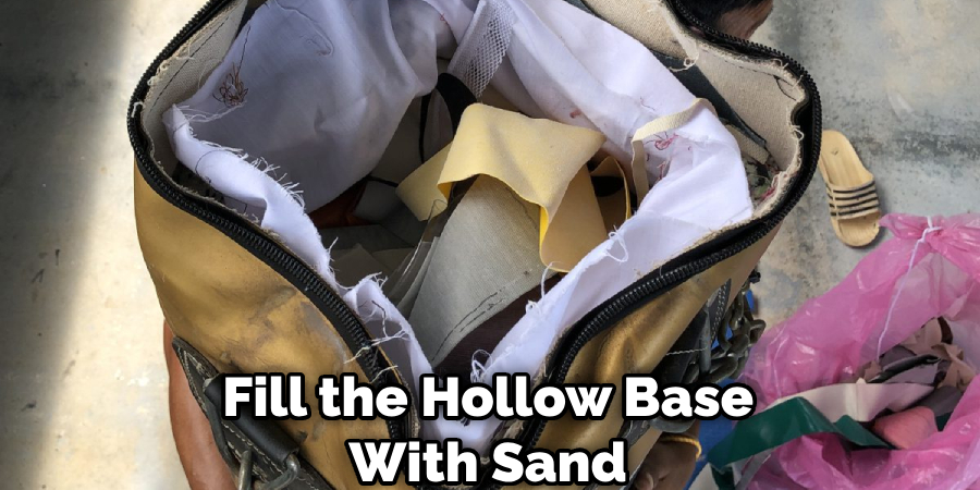 Fill the Hollow Base With Sand