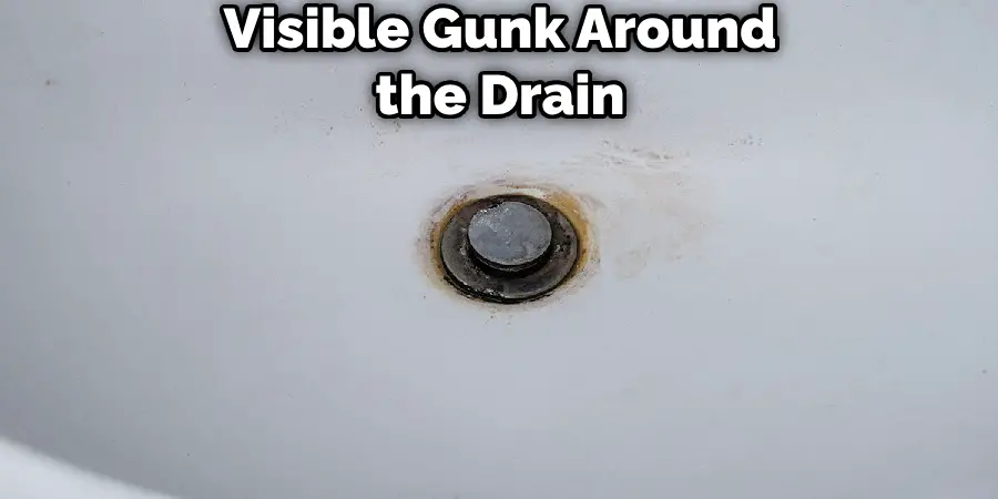 Visible Gunk Around the Drain